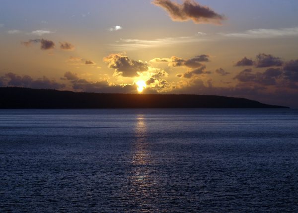 Blick von der Veranda auf den Sonnenuntergang in Christmas Island